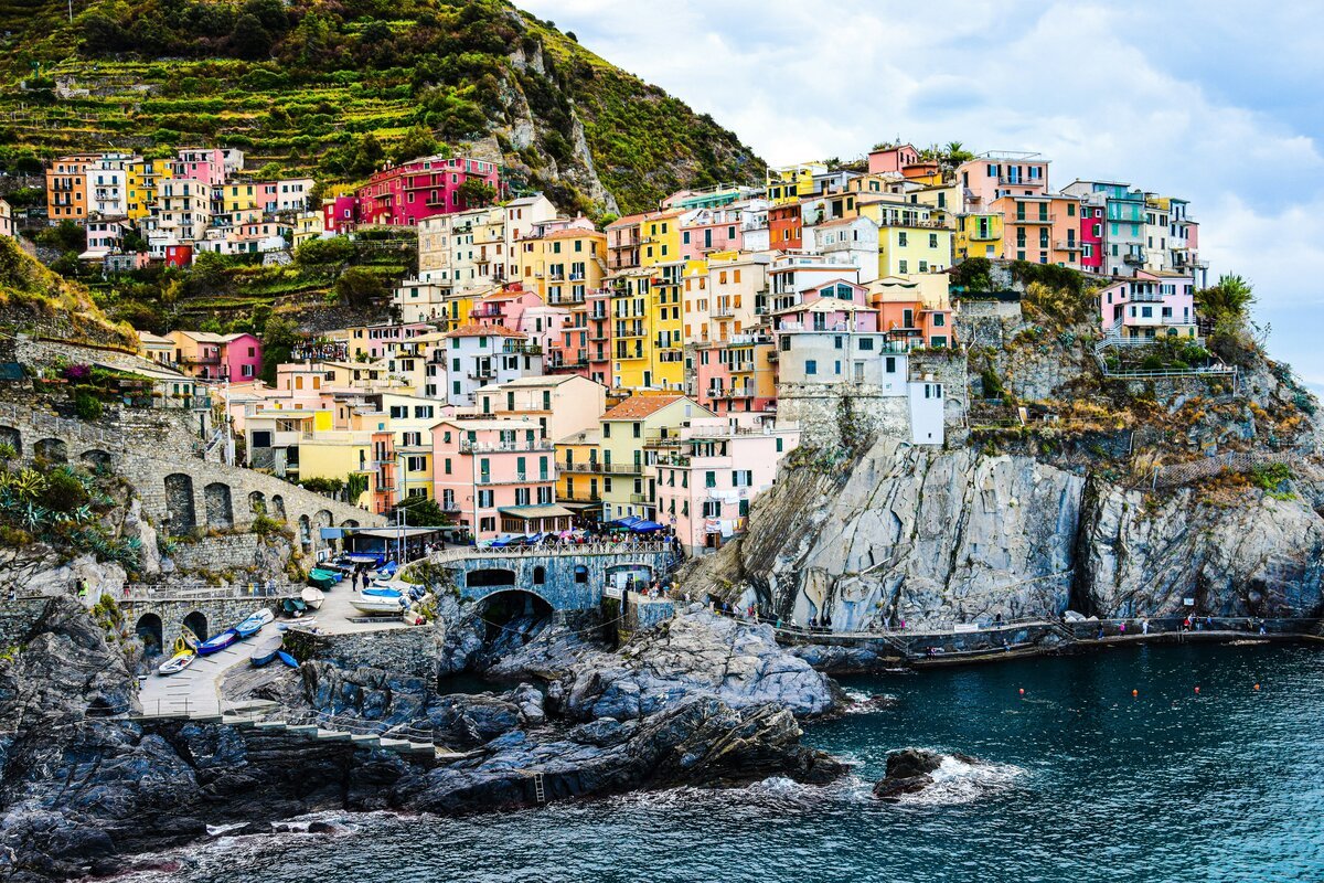 Manarola, Cinque Terre, Liguria, Italy. Stunning scenery multi-colored building perched upon a hilly coast all on top of each other